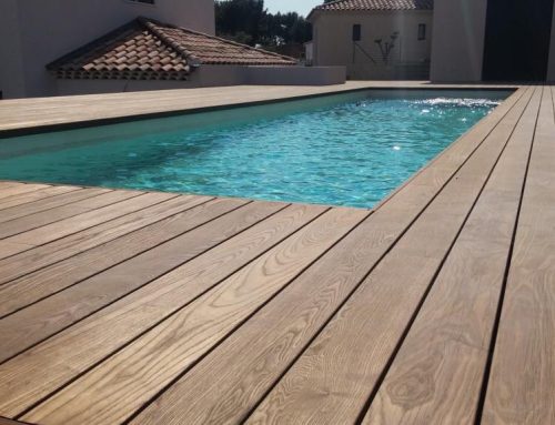Conception d’une terrasse en bois près de votre piscine